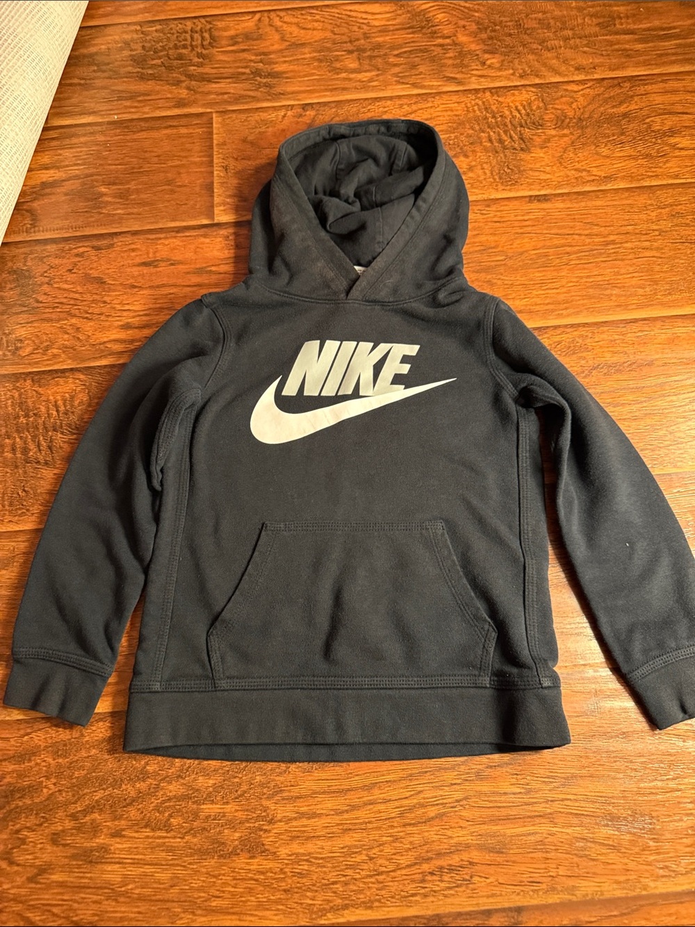 Nike Black Hoodie with White Swoosh Logo. Youth 7. Good condition
